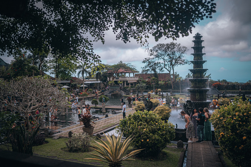 Bali, Indonesia - October 11, 2022: \nA popular tourist destination in Bali, Tirta Gangga  Water Palace.