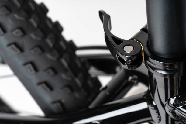 istock Black bicycle on white background close up 1956715602