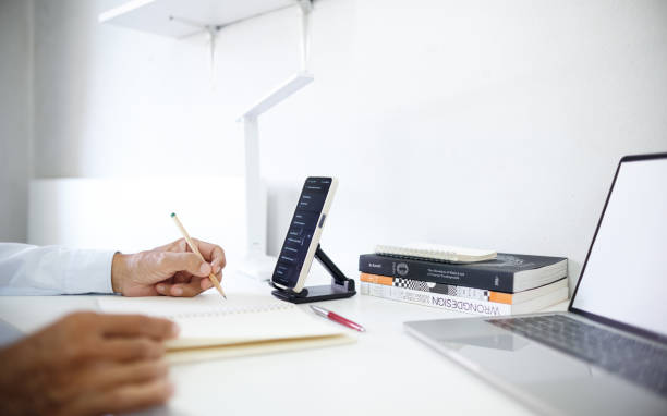 istock businessman working with laptop and document 1956717695