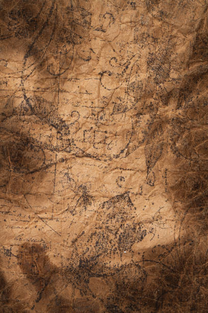 Close-up vintage craft burnt paper texture with floral ornament