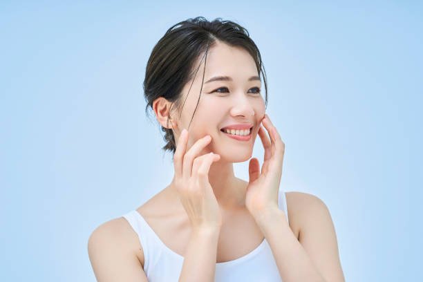 istock asian woman doing skin care 1956773779