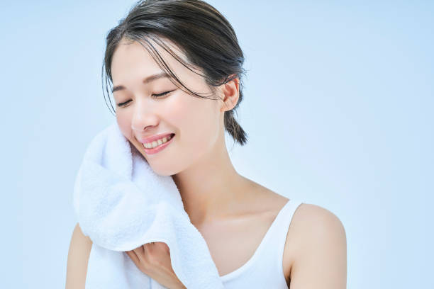 istock asian woman wiping her face 1956777460