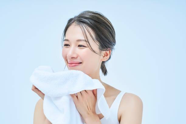 istock asian woman wiping her face 1956777468