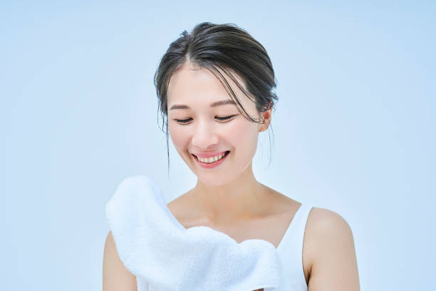 istock asian woman wiping her face 1956777992