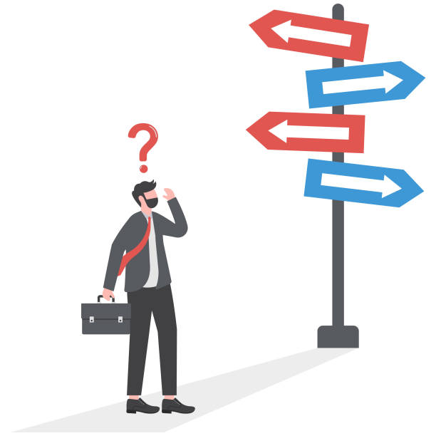 istock businessman looking choice sign at multiple road with thinking which way to go.question mark and right solution people achievement 1956782140