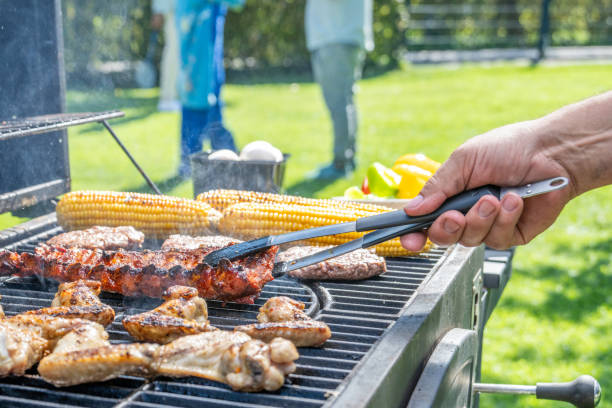 istock Meat and vegetables being roasted on grill 1956782665