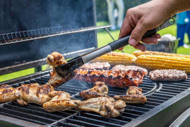 istock Meat and vegetables being roasted on grill 1956782667