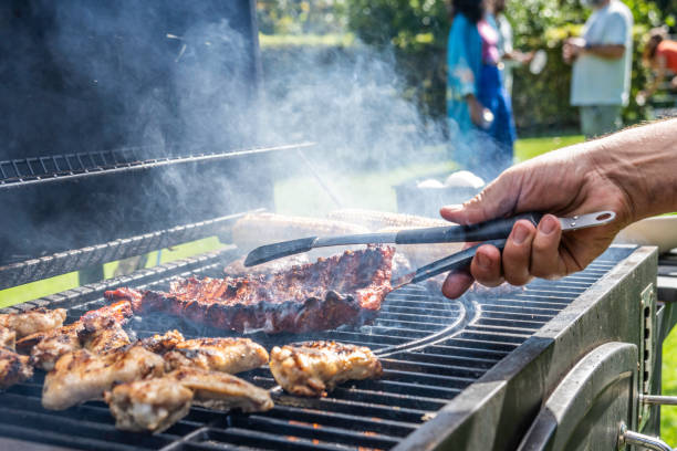 istock Meat and vegetables being roasted on grill 1956782671