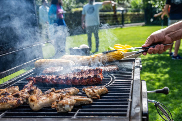 istock Meat and vegetables being roasted on grill 1956782674