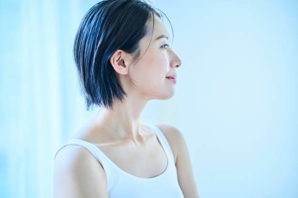 istock A woman relaxing by a window 1956786338