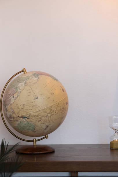 istock A school globe on a wooden stand is on the table 1956787408