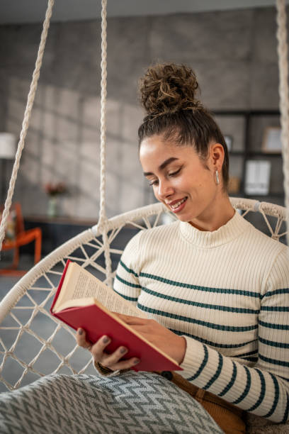 istock A good book grabs my attention and I enjoy reading it 1956802405