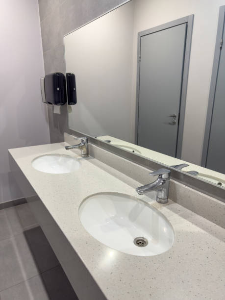 istock White washbasin with tap in the restroom 1956803517