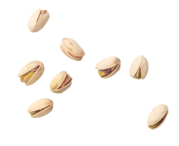 istock Fresh pistachios isolated on white background. Macro 1956806289