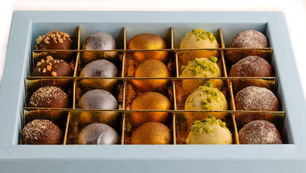 istock different types of chocolate bonbons on white background 1956814292