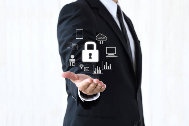 istock Business man holding padlock with various information data and devices icon 1956834924