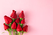 Red Roses on Pink Background