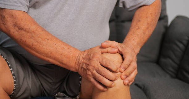 istock Asian elderly man suffering from osteoarthritis. 1956931950