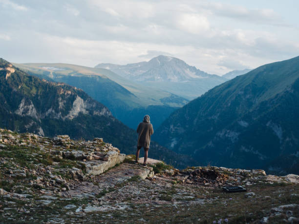 Lonely man mountains nature travel landscape. High quality photo