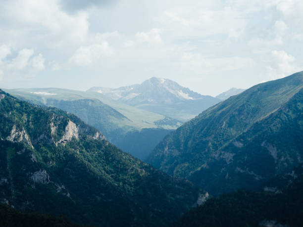 istock Mountains nature landscape travel clouds freedom 1956982608