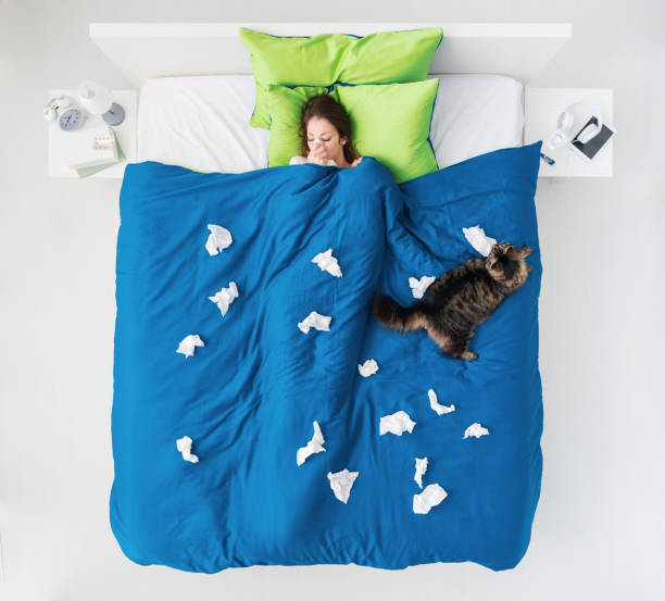 istock Sad woman at home with flu 1956986320