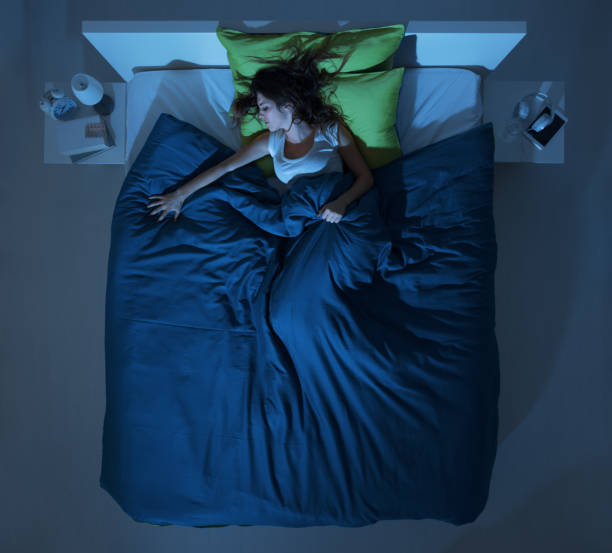 istock Woman sleeping in the bedroom 1956988441