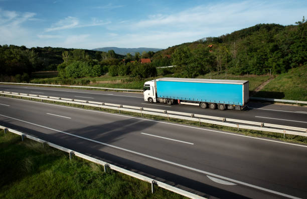 istock Truck with semi-trailer on highway 1956992997
