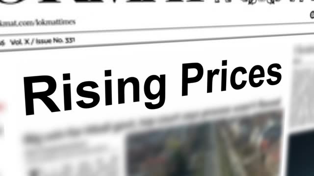 Rising prices headline printing on newspapers concept.
