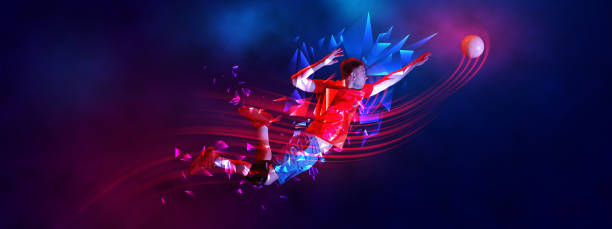 istock Dynamic image of young man, handball player in motion, training on gradient background with polygonal and fluid neon elements. 1957058533