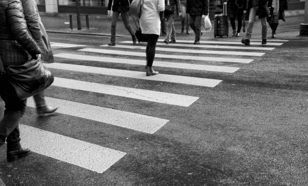 istock Crossing a street. 1957060192