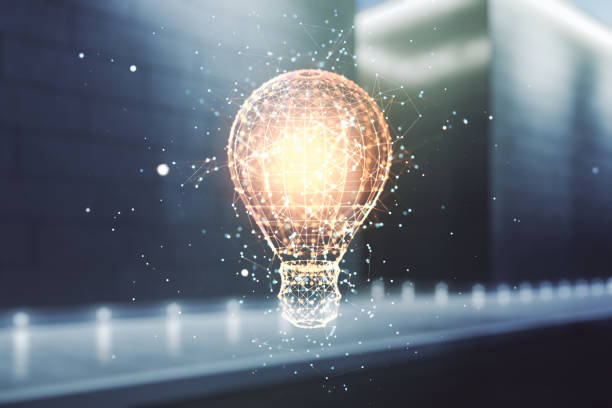 istock Abstract virtual light bulb illustration on blurry contemporary office building background, future technology concept. Multiexposure 1957071747