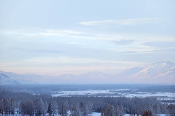istock Cold snowy mountain landscape at sunset. 1957086436