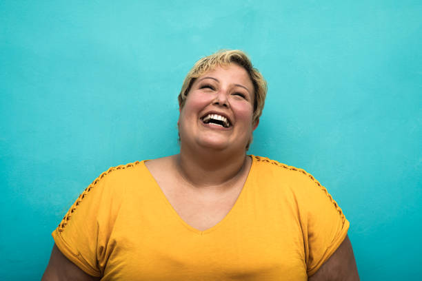 Happy plus size smiling woman portrait