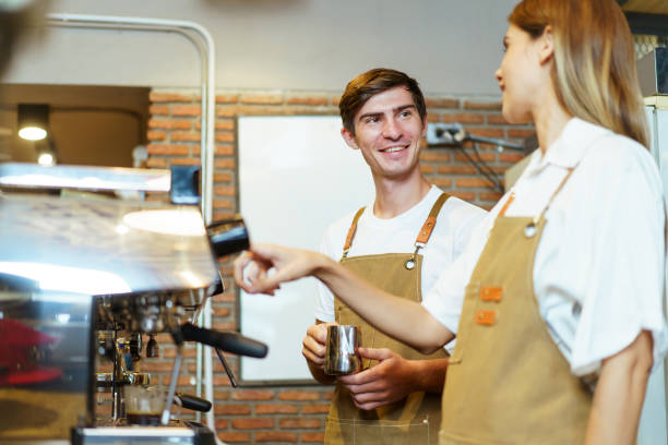 istock Barista working in coffee shop. 1957095902