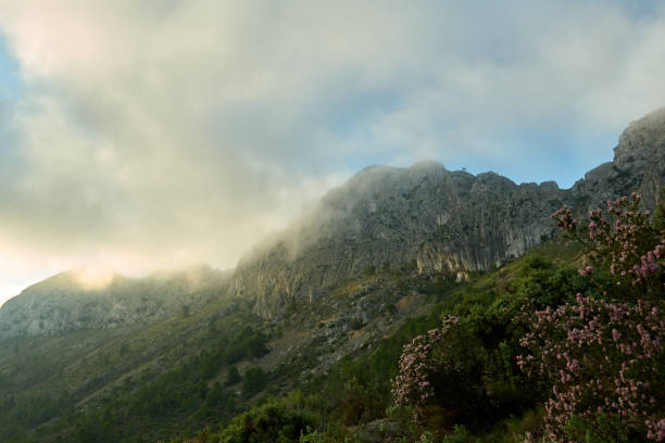 bernia mountain between clouds