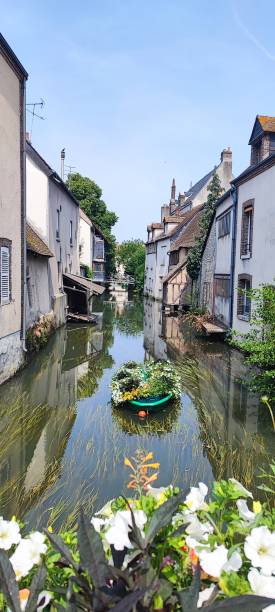 istock Small river in Montargis under the sun 1957118899
