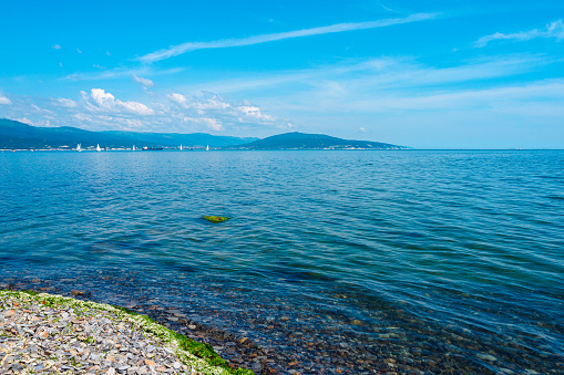 View of the Tsemess Bay of the Black Sea from the Sudzhuk Spit in Novorossiysk, Russia in summer