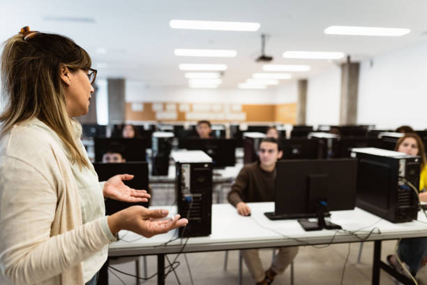 Female student studying using a desktop.