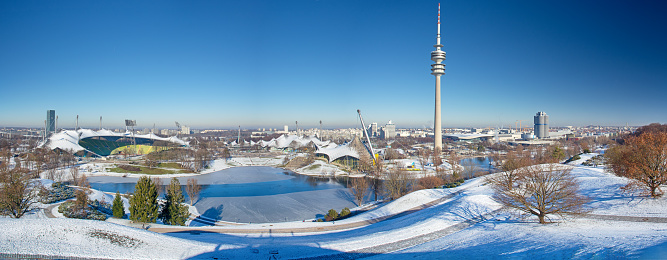 Panoramic view over the Olymic park (Olympiapark München) in Munich at winter, Germany