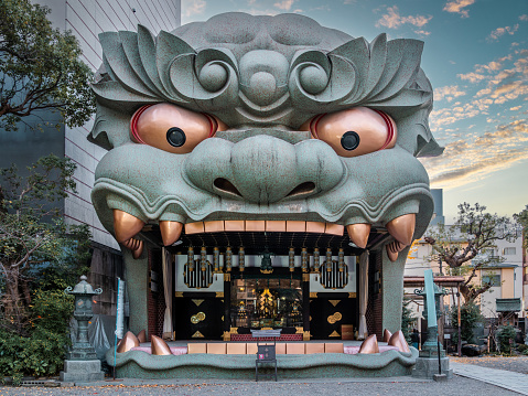 Osaka, Japan - December 12, 2023: The Namba Yasaka-jinja Shinto shrine in Osaka, Japan, famous for its enormous lion head-shaped building.
