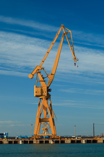Cranes of the dockyards of Cádiz in a sunny day