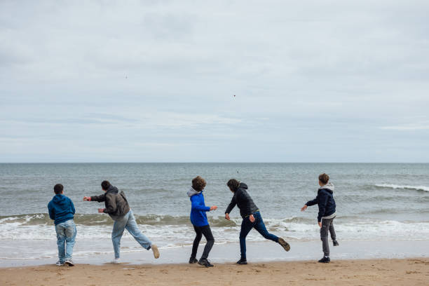 istock Throwing Stones at the Coast 1957233032
