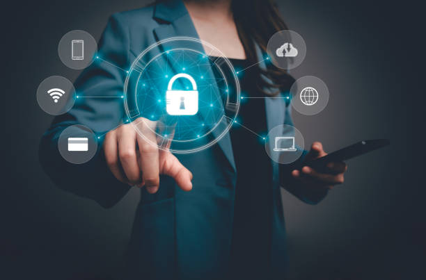 istock Concept of network security system. Businesswoman using smartphone set up network connection with shield guard to protected from cyber attacks. 1957278568