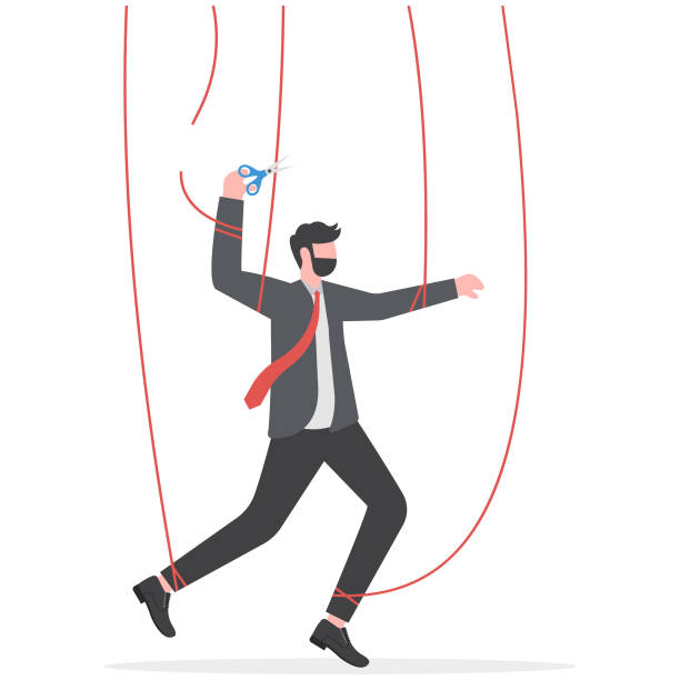 istock Freedom for work and decision making, authority to work independently, stop micromanagement, or people manipulation concept, businessman marionette, puppeteer use scissors to cut controlled strings. 1957290963