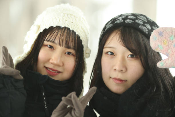 Diverse group of women enjoy in park on the fresh winter air