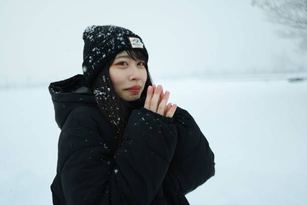 istock Young women relaxing at winter park 1957334216