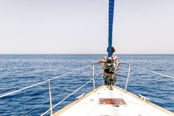 istock Woman relaxing on a sailboat bow 1957426837