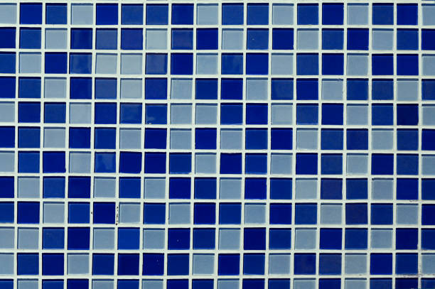 istock Various blue ceramic bathroom tiles on the wall. 1957428276