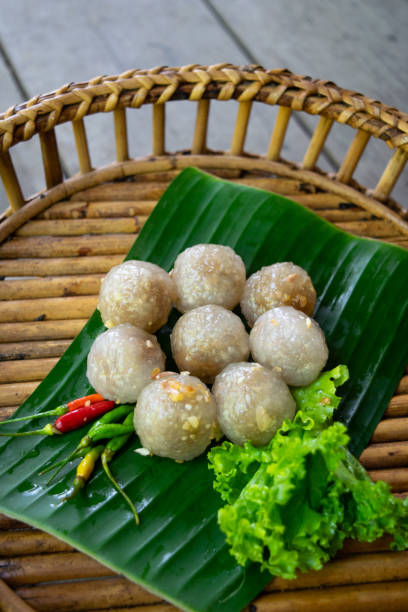 istock Steamed Sago Balls and Condiments on Banana Leaf 1957433454