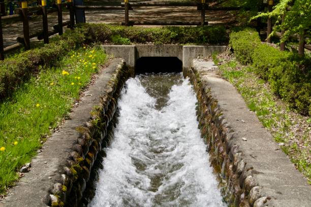 istock Water flowing vigorously through a man-made channel 1957453697